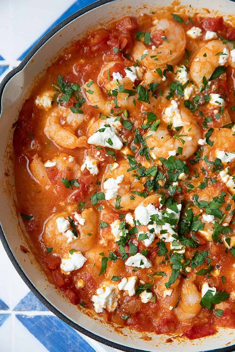 Shrimp Saganaki with feta and tomatoes is a quick and flavorful Greek dish that's perfect for a quick lunch or dinner. With shrimp, tangy feta, and a rich tomato sauce, it's both satisfying and easy to prepare. A simple one-pan recipe for those busy days where you're craving something flavorful. Shrimp Saganaki With Feta, Shrimp Saganaki Recipe, Dinner With Shrimp, Greek Fried Cheese, Shrimp With Tomatoes, Shrimp Saganaki, Saganaki Recipe, Greek Shrimp, Tomatoes And Feta