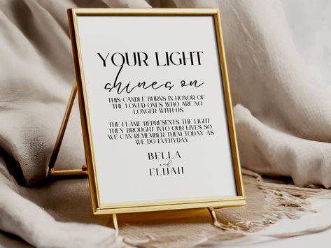 "We are honored to offer our \"Your Light Shines On\" sign, a beautiful and minimalist wedding signage that is perfect for remembering loved ones who have passed away. This memory table sign features a simple and elegant design with the phrase \"Your Light Shines On\" in modern fonts. This loving memory sign is a beautiful way to remember those who cannot be with us on our special day. Our memorial candle sign is also perfect for a memory sign for a wedding and can be used with a candle to create a beautiful memorial display for your loved ones. You can also use the sign without a candle if you prefer. This wedding candle sign is a great way to honor your loved ones and keep their memories alive. The sign is a forever in our hearts reminder of their love and presence in your life. This can This Candle Burns In Loving Memory, In Memory Of Wedding Ideas Display, Memorial Table At Wedding Display, Memory Table Wedding Display, Memorial Candle Wedding, Remembrance Table, Candle Sign, Memory Table Sign, Memory Wedding Sign