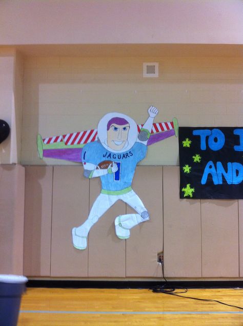 "To Infinity and Beyond" pep rally theme.  Buzz Lightyear dressed in a Johnson Jaguar's football jersey. Disney Pep Rally Ideas, Disney Pep Rally, Pep Rally Outfits, Football Spirit Signs, Pep Rally Themes, Stuco Ideas, Rally Ideas, Homecoming 2023, Rally Idea