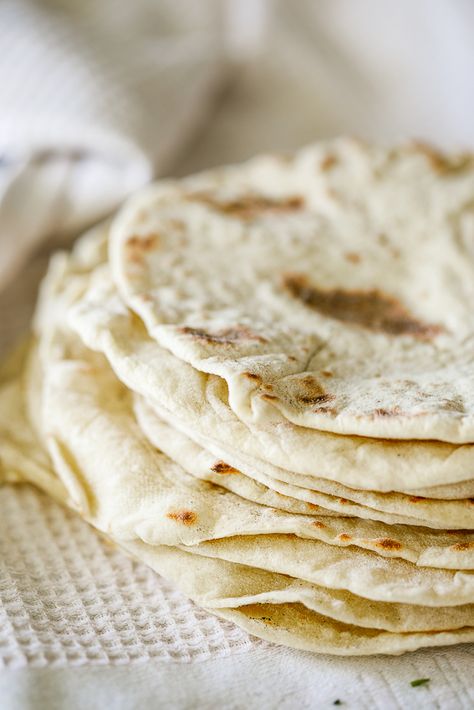 Making homemade flour tortillas is super easy made with simple ingredients. The tortillas are warm, fluffy and perfectly seasoned. No yeast needed! #Flourtortillas #tortillas Flatbread Sandwiches, How To Make Flour, Homemade Flour, Recipes With Flour Tortillas, Homemade Flour Tortillas, Kitchen Basics, Flour Tortilla, Personal Pizza, Tortilla Recipe