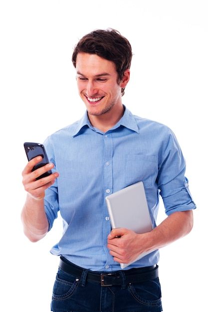 Free photo smiling man using wireless de... | Free Photo #Freepik #freephoto #man-with-tablet #man-standing #man-phone #man-smartphone Man Looking Up, Using Phone, Happy Man, Smiling Man, Digital Tablet, Man Standing, Free Photo, Free Photos, Mobile Phone