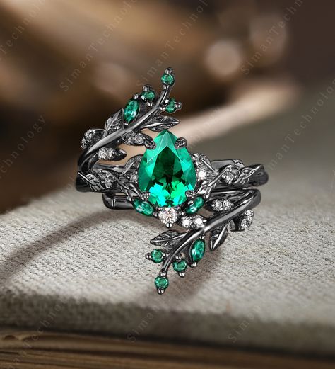 Unique Leaf Emerald engagement ring set Vintage Black gold Marquise cut enhance Curved Wedding Band Stacking Bridal set Anniversary gift Applicable scene: anniversary, birthday party, wedding, engagement, gift ■ Handmade, high-quality item! ■ Material: S925 Sliver SOLID 14K/18K GOLD (can be made in white/rose/yellow gold) Engagement ring ■ Center stone: lab emerald ■ Size/Weight: 6*8mm Pear  ■ Side stones: Moissanite ■ Total weight: 0.15 ct (High Quality) ■ Cut - VG ■ Color: G-H ■ Clarity: SI-VS Ring Vintage Aesthetic, Tungsten Engagement Ring For Women, Forest Green Ring, Unusual Wedding Rings Women, Pretty Rings Unique, Emerald Green Wedding Ring, Dark Engagement Ring, Unique Rings Engagement, Black Ring Wedding