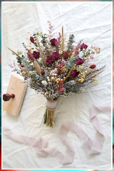 Looking for the perfect wedding flower arrangements for your big day? Look no further! These stunning wedding flower arrangements will add a touch of elegance and beauty to your special day. From bouquets to centerpieces, find the perfect floral inspiration here. Say "I do" to these gorgeous wedding flowers! Burgundy Bridal Bouquet, Whimsical Bouquet, Teal Burgundy, Dried Flowers Bouquet, Hot Pink Roses, Boquette Flowers, Boho Bouquet, Nothing But Flowers, Flower Therapy