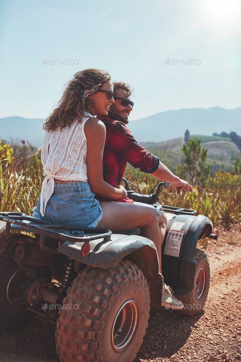 Young couple enjoying a quad bike ride in countryside by jacoblund. Portrait of young man and woman in nature on a off road vehicle. Young couple enjoying a quad bike ride in countryside. Countryside Couple, Woman In Nature, Couple Cruise, Countryside Photos, Leisure Lifestyle, Bike Couple, Atv Riding, Off Road Vehicle, Quad Bike