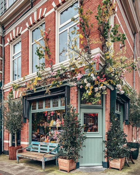 Jasmijn Bloembinders Haarlem @themorningstories fantastic floral shopfront @jasmijn_bloembinders and loving the vintage painted bench to rest a while - and don't forget to use our new hashtag #localshopfronts to share #shoplocal love #shopfront #flowershop #sharingtheworldsbestshops Shop Exterior, Painted Benches, Vintage Bakery, Victoria Magazine, Building Front, Coffee Shop Aesthetic, Florist Shop, Shop Fronts, Floral Shop