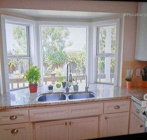 45 Kitchen Windows Over Sink Ideas and Designs Sink With Bay Window, Garden Kitchen Window Over Sink, Kitchen Sink With Bay Window, Bay Window Kitchen Counter, Kitchen Bay Windows Over Sink, Bay Window Countertop, Bay Window Bathroom Ideas, Bay Window Behind Kitchen Sink, Bay Kitchen Window Ideas