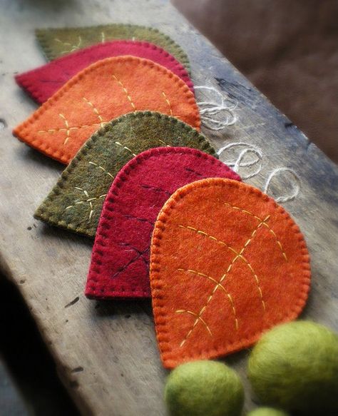 Little fall leaves sewn from wool or felt. These are actually coasters, but gives me an idea to make them in miniature and turn my tiny kitchen "Christmas" tree into a autumn tree with lights and tiny wool leaves for fall. Cute! Fall Coasters, Felt Leaves, Wool Projects, Penny Rugs, Autumn Crafts, Wool Crafts, Felt Diy, Felt Hearts, Felt Christmas