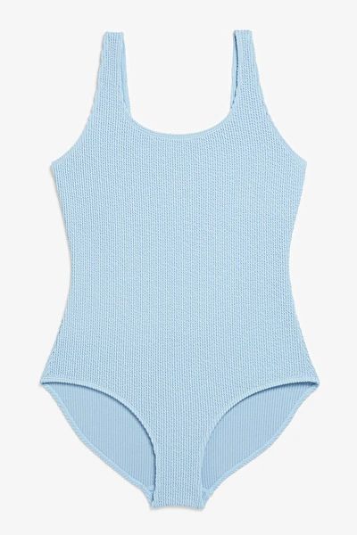 Light Blue Swimsuit, Fitted Sleeveless Light Blue Swimwear, Playful Fitted Light Blue Swimwear, Summer Light Blue One-piece Bodysuit, Blue One-piece Bodysuit For Sunbathing, Light Blue One-piece Beachwear Bodysuit, Blue One Piece Swimsuit, Blue Swimsuit, Cut Out Design