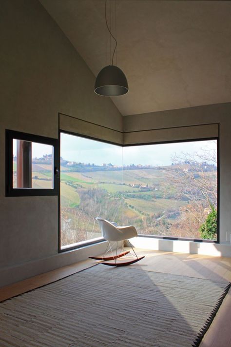 Windows as landscape frames at Picture House in Ripatransone, Italy by Barilari Architteti - I love the way that glass meets glass - it reminds me of Ditch End, the house that this board is dedicated to. Corner Window, Large Window, Design Case, Large Windows, 인테리어 디자인, House Inspiration, My Dream Home, Interior Architecture Design, Rocking Chair