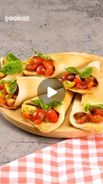 Cookist Wow on Instagram: "For a tasty and incredibly unique way to serve your #appetizer, make these BREAD CONES! 😍 
We stuffed them with cherry tomatoes, basil, oregano, salt, pepper and olive oil, but you can use your favorite ingredients 😋💪

👉INGREDIENTS
Slice of bread
Basil
Cherry tomatoes
Olive oil
Oregano
Salt & pepper

👉METHOD
1. Flatten several slices of bread.
2. Take one end and fold it in half, repeat from the other end forming a cone.
3. Place in an air fryer and cook for 15 minutes at 180°C (356°F).
4. Mix cherry tomatoes with olive oil, oregano, salt and pepper.
5. Fill the cones with the tomato mixture.
6. Decorate with basil.

Any other ideas for the stuffing? Let us know in the comments 👇

#cookistwow #foodlover #foodblog #quick #easy #fun #delicious #homemade #cook Bread Cones, Oregano Salt, Homemade Cooking, Slice Of Bread, High Tea, Cherry Tomatoes, Salt Pepper, Finger Foods, Oregano