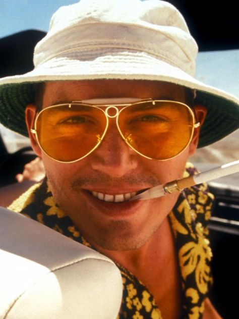 Fear and Loathing in Las Vegas  Before there was The Hangover, there was Fear and Loathing in Las Vegas. Sporting giant yellow aviators and a dazed expression, Depp plays a drug-addicted journalist tripping his way through Sin City in this 1998 cult classic. Road Trip Movie, Michael Clayton, Barnabas Collins, Hunter S Thompson, Johnny Depp Movies, Fear And Loathing, Sweeney Todd, Willy Wonka, Quentin Tarantino