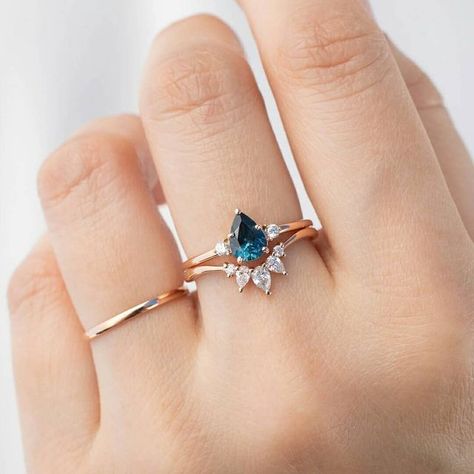 Envero Jewelry New York on Instagram: "Irresistible bridal ring stack💗 Emilie Ring - 0.90ct Pear Teal Montana Sapphire and Gloria's Tiara Ring✨" Montana Sapphire Engagement, Montana Sapphire Engagement Ring, Ivory Ring, Montana Sapphire Ring, Shiny Rings, Gold Sapphire Ring, Paper Ring, Engagement Inspo, Montana Sapphire