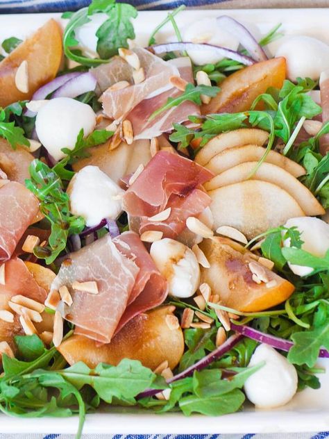 Easy prosciutto and pear salad recipe! Juicy pears, mozzarella cheese and prosciutto on a bed of arugula, dressed with a honey balsamic dressing! Pear And Prosciutto, Fig Salad Recipes, Bistro Salad, Prosciutto Salad, Honey Balsamic Dressing, Pear Salad Recipes, Sliced Pears, Juicy Shrimp, Honey Balsamic