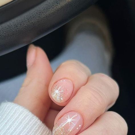 Shelley Graham on Instagram: "Love getting sent cute client nailfies, @the_house_acc took this gorgeous photo of her Christmas nails. 

All products from @the_gelbottle_inc 
Biab 19
Watchme (gold glitter)
Daisy (studio gel)

#glitterombrenails #glitternails #goldnails #starnails #christmasnails #christmas #folkestonenails #folkestone #festivenails #subtlechristmasnails #simplechristmasnails #tgbba2022 #gelbottlewatchme #tgbwatchme #thegelbottle #thegelbottleinc #nails #gelpolish #gelnailart #nailart #nailinspo #ukfashion #plt #missguided #asos" Christmas Nails Biogel, Ems Nails, Gold Holiday Nails, Gell Nails, Em Nails, Ombre Nails Glitter, Christmas Nails Easy, Star Nails, Festival Nails