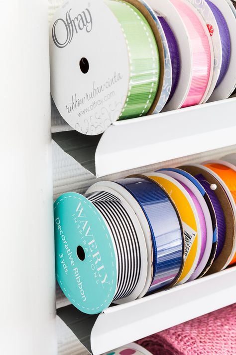 Have a spools of ribbon that need organizing? Here is an easy DIY ribbon organizer that you can make and custom size to your needs. Craft room organizing ideas. Color on the wall in such an unexpected way! Craft Room Organizing Ideas, Room Organizing Ideas, Craft Ribbon Storage, Craft Room Organizing, Ribbon Organizer, Ribbon Holders, Ribbon Organization, Ribbon Storage, Organize Craft Supplies