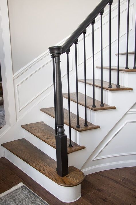 Easy Stair and Entry Updates - Sypsie Designs Black And Wood Stairs Stairways, Black Wooden Handrails For Stairs, Black Stair Railing Wood, Staircase With Black Railing, Urbane Bronze Stair Railing, Black Stained Stair Railing, Colonial Stair Railing, Updated Colonial Staircase, Black Painted Stair Railing