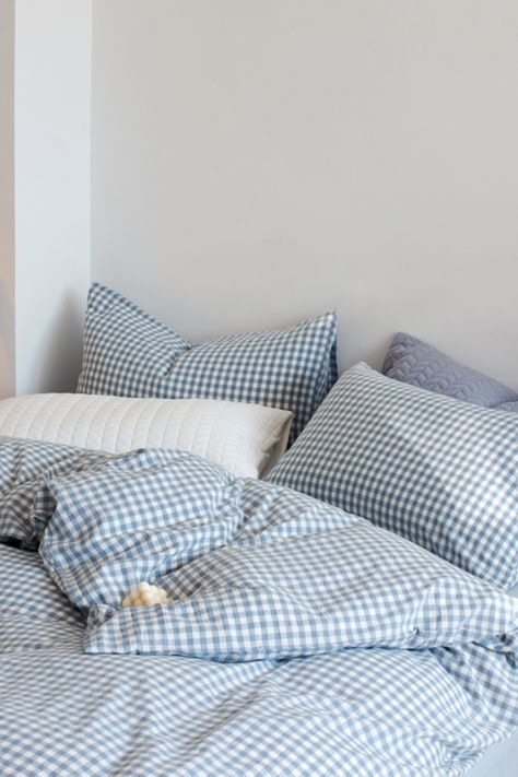 Transform your dorm room or cottage into a serene escape with this stunning gingham bedding set! With its cozy cotton material and eye-catching design, it's the perfect addition to your 2024 trending style. Don't miss out on the opportunity to make your space unforgettable - Grab 20% off your first order! Light Blue Gingham Bedding, Bedding Ideas Dorm, Preppy Coastal Bedroom Aesthetic, The Summer I Turned Pretty Bedroom, Blue Gingham Bedding, Cute Bedding Sets, Baby Blue Dorm Room, Scandi Bedding, Gingham Bedding Aesthetic