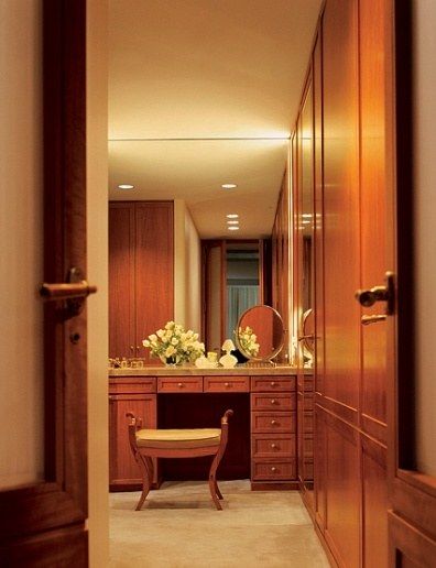 “It was an attempt to coordinate tradition in a modern way,” the late Naomi Leff said of the Manhattan pied-à-terre she designed for Sidney and Maddie Forbes. Leff installed recessed lighting throughout much of the apartment, including a corridor that was converted into a dressing room, above. “The fewer the lamps, the more modern the feeling,” she said. The circa 1930 French Art Déco mirror was designed by Léon Jallot. (April 2004) French Art Deco Mirror, Installing Recessed Lighting, Dressing Room Closet, Dressing Rooms, Closet Lighting, Art Deco Mirror, Room Closet, Design Your Dream House, Cabinet Design