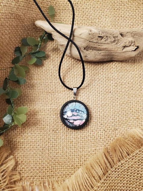 Excited to share the latest addition to my #etsy shop: Fluid Art Original Art Necklace, Blue and pink with black wood tray and cord. Sunset over the water pendant necklace https://etsy.me/3YHqdoO #originalart #unique #painting #necklacependant #blackbluepink #woodpenda Pour Paint, Art Necklace, Art Necklaces, Painted Jewelry, Hand Painted Jewelry, Pouring Painting, Round Pendant Necklace, Pink Bubbles, Original Abstract Art