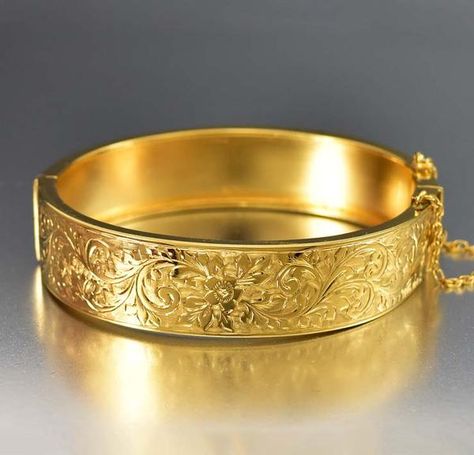 A forget me not flower pattern covers the front of this antique Edwardian bangle bracelet produced by Thomas Hopwood of Birmingham, England. The 18ct rolled gold bangle has a smooth back band and is ready for engraving a personalized message by your jeweler. Hinged on the side and closed with a secure slide clasp and s Gold Thick Bracelet, Victorian Yellow Gold Bangle Cuff Bracelet, Victorian Antique Gold Bracelet, Victorian 14k Gold Bangle, Luxury Victorian Gold Bangle, Victorian Yellow Gold Bangle Bracelet, Antique Jewellery Online, Textured Bracelet, Vintage Jewelry Antique