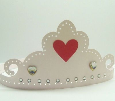 A simple-to-make paper tiara decorated with cut out heart, gemstones, and punched holes, but all sorts of other decorations would look equally good, especially glitter. Paper Tiara, Origami Crown, Decorated Paper, Dance Crafts, Princess Crafts, Crown Template, Hanging Craft Ideas, Crown For Kids, Crown Crafts