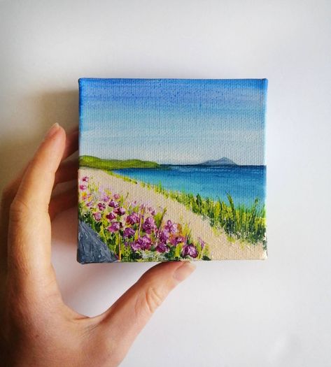 4x4 inch (10x10 cm) mini acrylic landscape of Scottish Beach Scene with pink floral detail.  Made in Scotland, UK.  This detailed original artwork is inspired by the beautiful landscapes of my home country, Scotland. Painted lovingly in acrylic on a mini 10x10 cm (4x4 inch) stretched box canvas, perfect to display in your living room, bedroom or hallway.  I will aim to post the painting within 1-3 business days. Delivery date will depend on destination location. ABOUT THE ARTIST: Hello! I'm Loui Scotland Art Painting, Mini Beach Paintings, 3x3 Canvas Paintings, Mini Canvas Landscape, Acrylic Beach Painting, Mini Acrylic Paintings, Art Mini Toile, Canvas Art Painting Abstract, Polymer Clay Painting