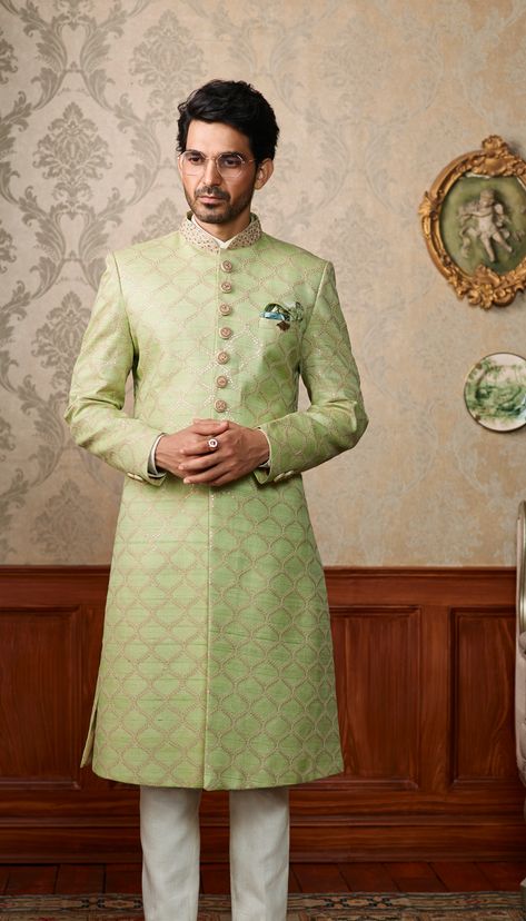 There’s an old world charm to the #Sherwani - one that epitomizes a grand life. Spark the #Celebrations with timeless Sherwanis from the #RaymondCeremonial collection! The Ensemble: Mint green Sherwani with matte gold sequence embroidered pattern. Raymond Shop, Green Sherwani, Old World Charm, Ahmedabad, Matte Gold, Black Outfit, Old World, Mint Green, Trench Coat