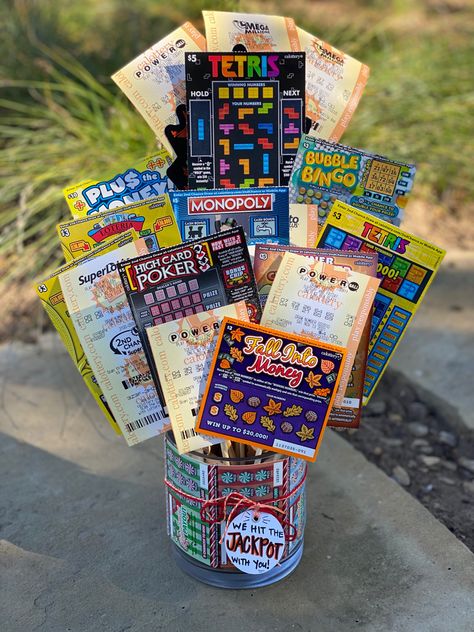 Made with LOTTO love. Message- “We won the JACKPOT with you!!!!” Lotto Ticket Bouquet Diy Gifts, 50th Birthday Lottery Ticket Gift, Lotto Gift Ideas, Lotto Ticket Basket, Scratcher Bouquet Lottery Tickets, Lotto Ticket Bouquet, Lottery Tickets Gift Ideas Birthdays, Lotto Ticket Gift Ideas, Lotto Ticket Gift