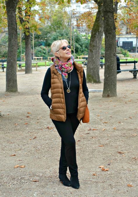 Outfit with gold uniqlo down vest. Details at une femme d'un certain age. Net Outfit, Gold Vest, Boho Fashion Over 40, Puffer Vest Outfit, Mens Fashion Dressy, Vest Outfit, Older Women Fashion, Over 50 Womens Fashion, Vest Outfits