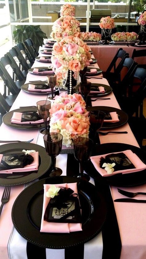 #Bridal shower decor # white hydrangeas, different pink tones, and pearls for a channel theme. Design by Exclusive Designs & Events Chanel Table Setting, Black White Pink Bridal Shower Decor, Coco Chanel Bridal Shower Theme, Paris Theme Table Setting, Channel Theme Party Ideas, Paris Table Setting Ideas, Pink And Black Bridal Shower Ideas, Black And Pink Table Decor, Chanel Baby Shower Theme