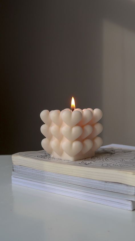 Our Valentine's day gift proposal- heart bubble candle made with soy wax.  Dimensions: 6cm width & depth / 6.5 cm /165g. Our sculptural candles are designed for decorative purposes.  🌱They are hand poured to order  using eco friendly and vegan friendly ingredients and packed in biodegradable or recyclable packaging. None of the products used to make our candles have been tested on animals. INGREDIENTS: 100% SOY WAX, FRAGRANCE OIL , DYE , COTTON WICK. Please allow slight color difference due to Heart Bubble Candle, Valentines Day Candles, Candle Pics, Candle Bubble, Sculptural Candles, Heart Shaped Candle, Valentine Candle, Heart Candles, Gingerbread Candle