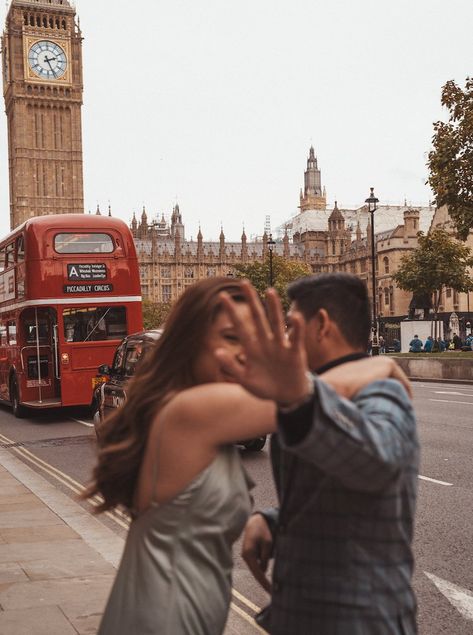 Laughing young Gen Z couple in love in London by Big Ben with a red bus in the background London Couple Aesthetic, London Engagement Photos, Traveling Couple Aesthetic, London Romance, London Honeymoon, London Proposal, London Diaries, London Elopement, London Photo Ideas