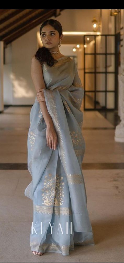 Gold work saree
Blue saree
Gray saree
Elegant design
Classy design
Simple style
Indian style
Floral design Optical Illusion Dress, Saree Blue, Indian Dress Up, Indian Ethnic Fashion, Trendy Saree, Keep Me Stylish, Saree Wearing Styles, Sarees For Girls, Desi Outfits