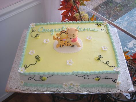 Winnie The Pooh Shower This is a sheet cake covered in buttercream with fondant honeybees and gumpaste flowers. The topper was purchased. Baby Shower Sheet Cakes, Pooh Bebe, Winnie The Pooh Cake, Pooh Party, Pastel Baby Shower, Winnie The Pooh Themes, Winnie The Pooh Baby Shower, Pooh Birthday, Disney Baby Shower