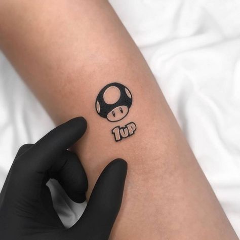 1 Up Mushroom, Super Mario Tattoo, Nintendo Tattoo, Mario Tattoo, Nintendo Mario Bros, Nerdy Tattoos, Mushroom Tattoo, Gamer Tattoos, M Tattoos