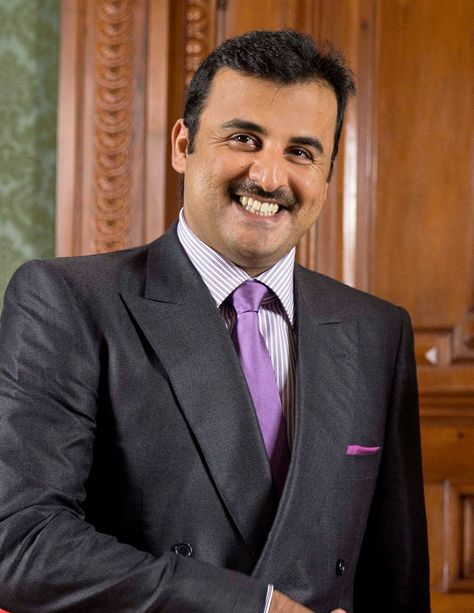 Sheikh Tamim bin Hamad Al Thani (B: 6/3/1980) is the 8th Emir of Qatar. He is the 4th son of the previous Emir, Hamad bin Khalifa Al Thani. He became Emir of Qatar on 6/25/2013 after his father's abdication. Wikipedia Hamad Bin Khalifa Al Thani, Tamim Bin Hamad Al Thani, Asian Royalty, Sheikh Tamim, Qatar Flag, Islamic Countries, Construction Logo Design, East Timor, Construction Logo