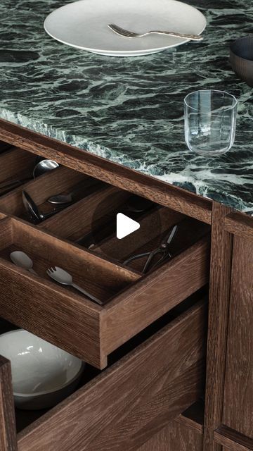 Nordiska Kök | Nordic kitchen on Instagram: "The green marble kitchen⁠ ⁠ Step into this modern kitchen with dark wood and lush green Verde Alpi marble, found in a beautiful beach house on the Rungsted coast, north of Copenhagen.⁠ ⁠ The smart pocket door cupboard is a popular feature amongst our kitchen designs which makes the cabinets slide smoothly into a pocket next to the cabinet. This allows you to either show off all your favorite decor or hide everything when your guests are coming over. ⁠ ⁠ Photo and styling @linethitklein and @mariegraunboel for Nordiska Kök ⁠ ⁠ #kitchenideas #kitcheninspiration #scandihome #kitchenisland #gothenburg⁠" Sapele Kitchen Cabinets, Green Marble Kitchen, Modern Kitchen Layout, Dark Wood Kitchen Cabinets, Dark Green Kitchen, Marble Kitchen Island, Dark Wood Kitchens, Marble Countertops Kitchen, Walnut Kitchen