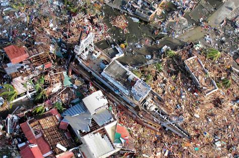 An aerial view of devastation and a ship after it was swept at the height of super typhoon Yolanda in Tacloban last Friday in this handout provided by Philippine Air Force. Typhoon Yolanda, Philippine Air Force, Tacloban City, Strait Of Magellan, Tacloban, Fraser Island, Abandoned Ships, Storm Surge, Ferry Boat