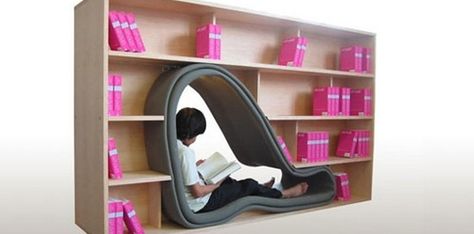 The cocoon that bookworms have been waiting for. |  Innovations That You Never Knew You Needed <3 this! Creative Bookcases, Kids Storage Furniture, Unique Bookcase, Computer Armoire, Creative Bookshelves, Cool Bookshelves, Dvd Storage, Modern Bookshelf, Bookcase Design