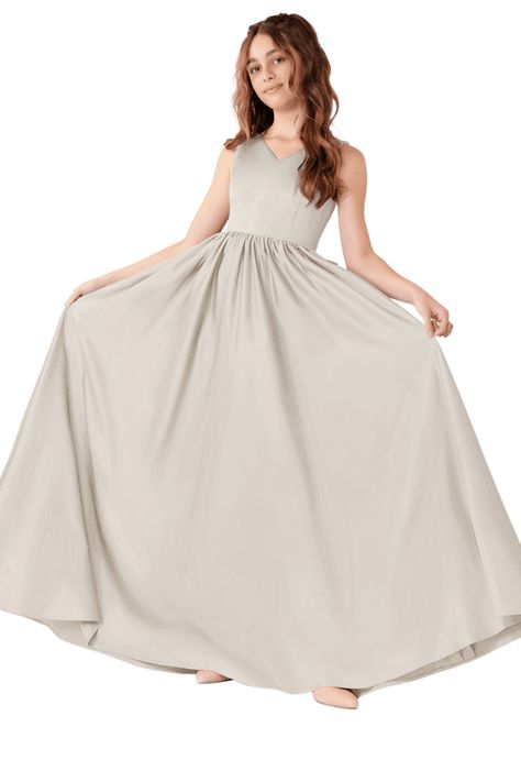 Hathaway JBD is floor-Length Matte Satin dress. She features V-neck and bow on the back. She comes in custom sizing.Her A line skirt can give you movement for your wedding dancing. Junior Bridesmaids Dresses, Wedding Dancing, Junior Girl Dresses, Maternity Bridesmaid Dresses, Military Ball Dresses, Special Event Dresses, Junior Bridesmaid Dress, Modest Bridesmaid Dresses, Ivory Dresses