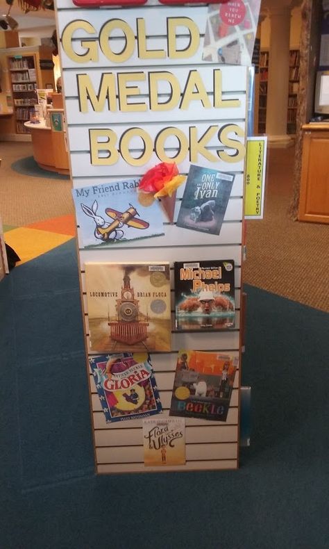 Gold Medal Books Library Book Display End Cap Olympics Summer Reading SRC Library Olympics, School Library Book Displays, Librarian Ideas, Library Window, Olympic Theme, Library Book Displays, Library Bulletin Boards, Book Displays, Library Display