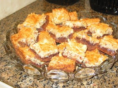 German Chocolate Ooey-Gooey Butter Cake. Paula Deen's recipe... made these today for my in-laws. Sinful! Haha NO these to not get pinned to "Healthy Life"! Ooey Gooey Cake, Dutch Butter Cake, Chocolate Butter Cake, Ooey Gooey Bars, Ooey Gooey Butter Cake, Cheese Bars, Gooey Cake, German Chocolate Cake Mix, Gooey Bars