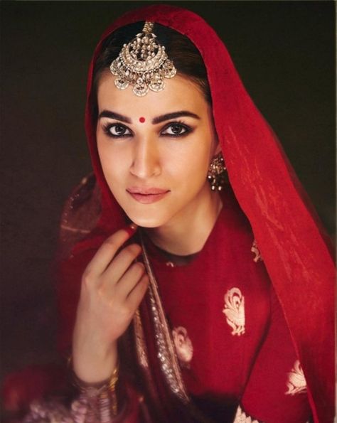 kriti sanon wrapped in the timeless elegance of vermilion red banarasi silk lehenga at namo ghat, kashi for @manishmalhotra Kriti Sanon Lehenga, Vermilion Red, Braids For Medium Length Hair, Style Lookbook, Kriti Sanon, Red Lehenga, Diamond Choker, Silk Lehenga, Outfit Style