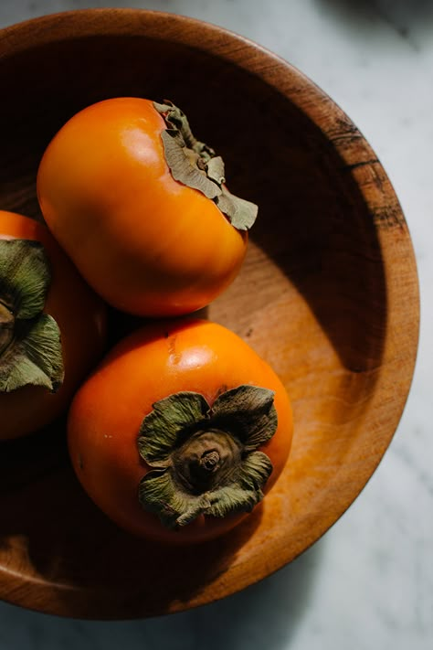 Baked Persimmon — Elizabeth Armstrong Baked Persimmons, Persimmon Photography, Persimmon Aesthetic, Arms Photography, Mushroom Dance, Orange Skin, Tree Textures, Dessert Fruit, Glass Baking Dish