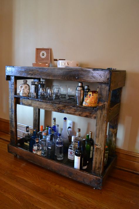 The Lazarus bar cart using only reclaimed wood, thick vines for the handle and under the bottom for support, and a lot of love. Western Bar Cart, Rustic Bar Cart Ideas, Bar Cart Diy, Country Bar Cart, Wooden Bar Cart With Doors, Liquor Cart, Wooden Bar Cart, Bar Cart Inspiration, Pallet Whiskey Rack