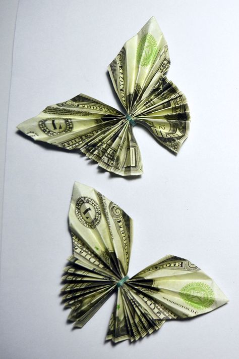 Money Butterfly Origami Tutorial Folded Dollar DIY Simple money butterfly of banknotes decorate your greeting card, gift, and also a beautiful interior decoration in your home. Only 3 minutes and you will be a beautiful butterfly of banknotes. I wish you pleasant viewing! If you like the video, click LIKE! Thank you! Butterfly Folding Paper, Origami Money Flowers Easy, How To Make A Butterfly Out Of Money, Butterfly Dollar Bill, Folding Dollars Into Shapes, Money Butterfly Origami, Oragami Money Easy, Money Flowers Diy Dollar Bills, Money Origami Easy