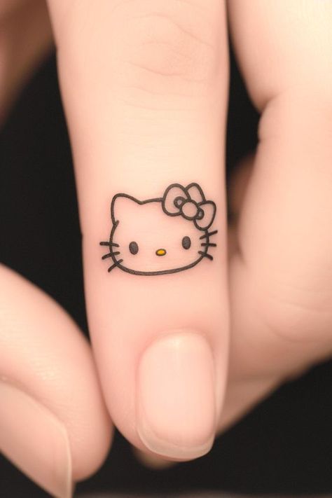 20 Adorable Small Hello Kitty Tattoo Ideas You’ll Want to Copy – Refined Aesthetique Small Hello Kitty Tattoo, Kitty Tattoo Ideas, Hello Kitty Tattoo Ideas, Small Hello Kitty, Tats Ideas, Hello Kitty Tattoo, Kitty Tattoos, Kitty Tattoo, Small Tats