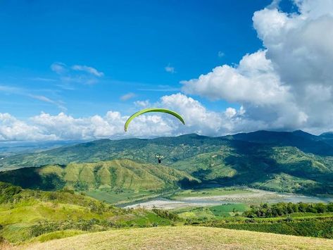 Have your own “Crash Landing” experience at Landingan Viewpoint, Nagtipunan, Quirino. Soar through the azure skies and over emerald fields with nothing but yourself and your parachute while paragliding over the country. Photo: @moonbeyondskies 📍Quirino, Cagayan Valley Cagayan Valley, Baguio, Environmental Science, Stardust, The Philippines, Minneapolis, Manila, Philippines, Natural Landmarks