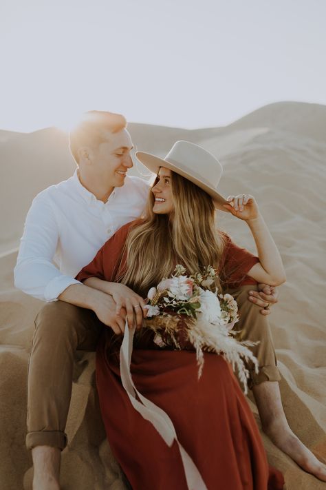 Burnt Orange Dress Photoshoot, Pre Wedding Desert, Burnt Orange Engagement Photos, Terracotta Engagement Photos, Desert Photography Ideas, Engagement Photos Boho, Engagement Photos Arizona, Orange Photos, Imperial Sand Dunes