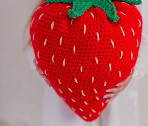 How to crochet a giant strawberry cushion | LoveCrafts Crochet Strawberry Pillow, Crochet Accessories Free Pattern, Strawberry Pillow, Giant Strawberry, Crochet Hook Case, Crochet Strawberry, Crochet Fruit, Crochet Cushion Cover, Crochet Pillow Pattern